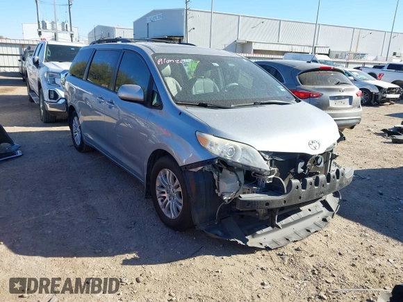 2014 Toyota Sienna XLE with VIN 5TDYK3DC7ES447903, listed as a IAAI auction lot 41835665 with 224,492 mi miles. Bid and sale history available at carsss.com. Image 1.