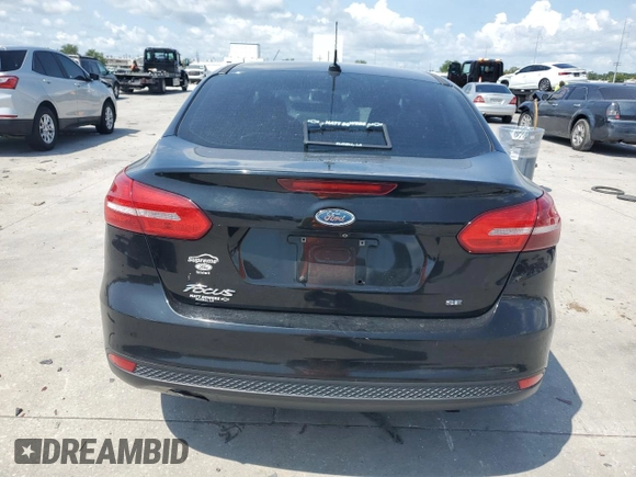2016 Ford Focus SE with VIN 1FADP3F23GL338269, listed as a Copart auction lot 59866175 with Not provided miles and Salvage title. Bid and sale history available at DreamBid. Image 6.