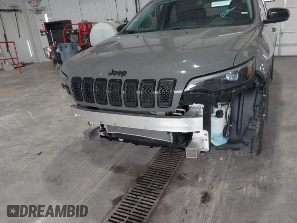 2023 Jeep Cherokee Altitude Lux with VIN 1C4PJMMBXPD115299, listed as a IAAI auction lot 41992492 with 60,232 mi miles. Bid and sale history available at carsss.com. Image 6.