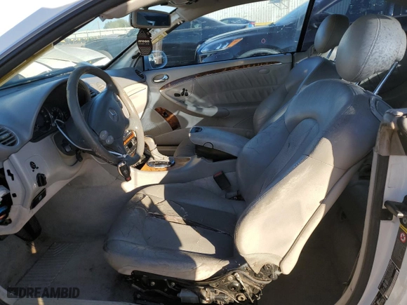 2003 Mercedes-Benz CLK-Class 5.0L with VIN WDBTJ75J23F016902, listed as a Copart auction lot 86643094 with 194,481 mi miles and Salvage Title. Bid and sale history available at carsss.com. Image 7.