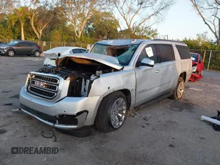 2020 GMC Yukon XL SLT z VIN 1GKS1GKC6LR238395, wystawiony jako IAAI lot #41522887 z przebiegiem Nie podano mil oraz . Historia ofert i sprzedaży dostępna na DreamBid. Obrazek 2.