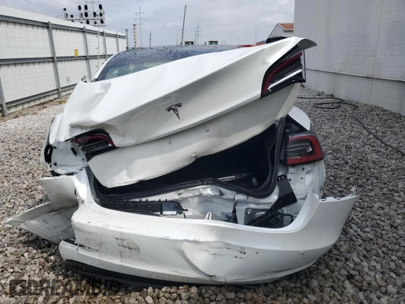 2019 Tesla Model 3 Mid Range with VIN 5YJ3E1EA6KF401661, listed as a Copart auction lot 54421225 with Not Provided miles and Clean Title. Bid and sale history available at DreamBid. Image 6.