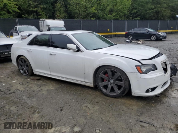 2012 Chrysler 300 SRT8 with VIN 2C3CCAFJ2CH801320, listed as a Copart auction lot 85705344 with 167,665 mi miles and Non Repairable. Bid and sale history available at carsss.com. Image 4.