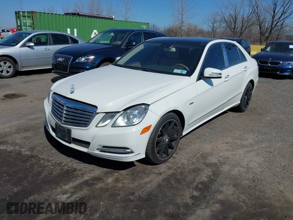 2012 Mercedes-Benz E-Class E 350 Luxury with VIN WDDHF8JB4CA651569, listed as a IAAI auction lot 41769849 with 150,074 mi miles. Bid and sale history available at carsss.com. Image 2.