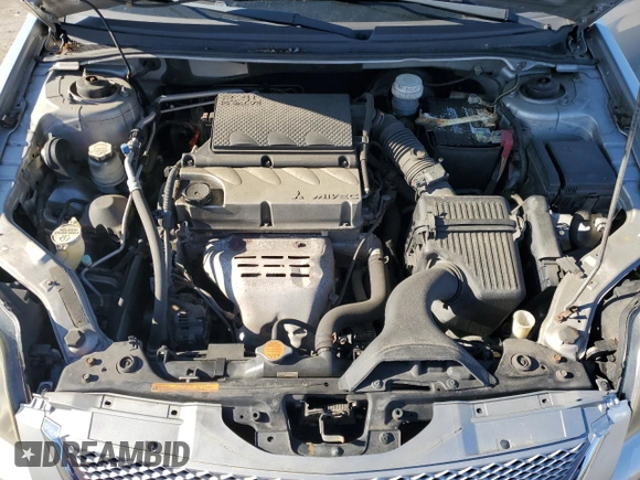 2011 Mitsubishi Galant FE z VIN 4A32B2FF4BE019972, wystawiony jako Copart lot #50345915 z przebiegiem 114 636 mil mil oraz Szkoda całkowita • Salvage title. Historia ofert i sprzedaży dostępna na DreamBid. Obrazek 11.