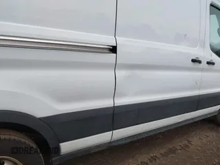 2019 Ford Transit with VIN 1FTYR3XM3KKB79919, listed as a IAAI auction lot 41882092 with 104,494 mi miles and . Bid and sale history available at DreamBid. Image 17.
