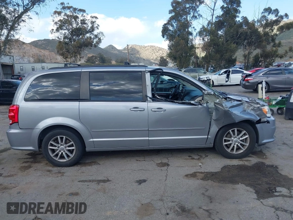 2016 Dodge Grand Caravan SXT with VIN 2C4RDGCG9GR180396, listed as a IAAI auction lot 41921312 with 130,256 mi miles and . Bid and sale history available at DreamBid. Image 14.