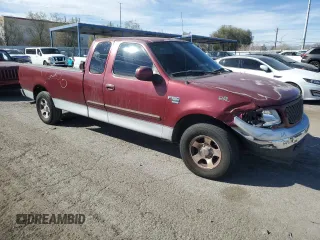 2003 Ford F-150 XL with VIN 1FTRX17WX3NA43805, listed as a Copart auction lot 44039095 with 170,874 mi miles and Salvage Title. Bid and sale history available at carsss.com. Image 4.