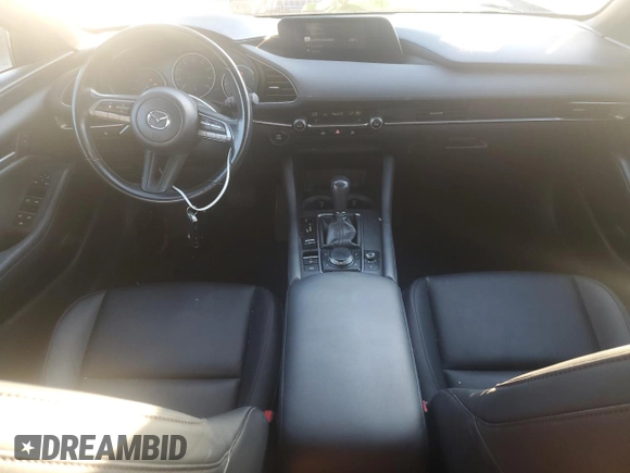 2021 Mazda 3 Select with VIN JM1BPBKL9M1345549, listed as a Copart auction lot 80771954 with 59,400 mi miles and Salvage title. Bid and sale history available at DreamBid. Image 8.