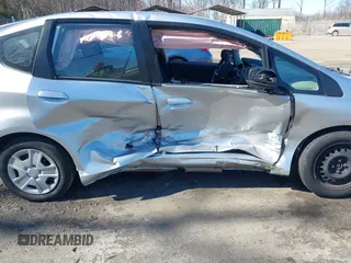 2013 Honda Fit with VIN JHMGE8H38DC048569, listed as a IAAI auction lot 41898777 with 130,461 mi miles. Bid and sale history available at carsss.com. Image 6.