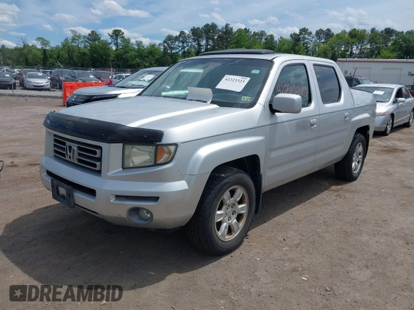 2006 Honda Ridgeline RTL with VIN 2HJYK16566H550339, listed as a IAAI auction lot 42223323 with 240,372 mi miles and . Bid and sale history available at DreamBid. Image 2.