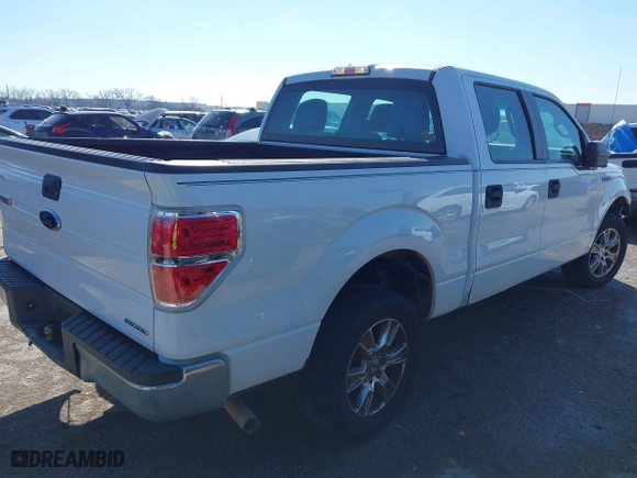 2013 Ford F-150 XL with VIN 1FTEW1CM6DKG34089, listed as a IAAI auction lot 41668428 with 173,709 mi miles. Bid and sale history available at carsss.com. Image 4.