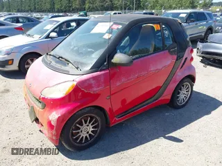 2012 Smart fortwo Pure z VIN WMEEJ3BA6CK527612, wystawiony jako IAAI lot #42750164 z przebiegiem Nie podano mil oraz . Historia ofert i sprzedaży dostępna na DreamBid. Obrazek 2.
