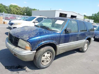 2001 GMC Jimmy SLE z VIN 1GKDT13W612136433, wystawiony jako IAAI lot #42336277 z przebiegiem Nie podano mil oraz . Historia ofert i sprzedaży dostępna na DreamBid. Obrazek 2.