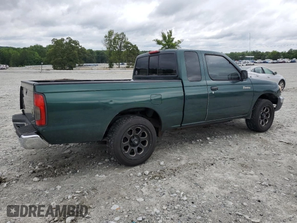 2000 Nissan Frontier XE with VIN 1N6DD26SXYC400648, listed as a Copart auction lot 58756855 with 148,051 mi miles and Salvage title. Bid and sale history available at DreamBid. Image 3.
