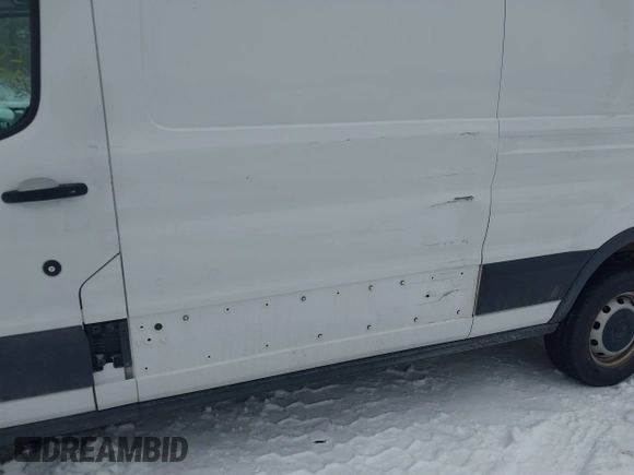 2016 Ford Transit Cargo z VIN 1FTYR2CM2GKA98918, wystawiony jako IAAI lot #41456987 z przebiegiem 51 290 mil mil oraz . Historia ofert i sprzedaży dostępna na DreamBid. Obrazek 6.