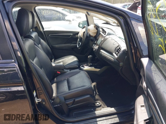 2015 Honda Fit EX-L with VIN 3HGGK5H81FM703713, listed as a IAAI auction lot 42525952 with 113,577 mi miles and . Bid and sale history available at DreamBid. Image 5.