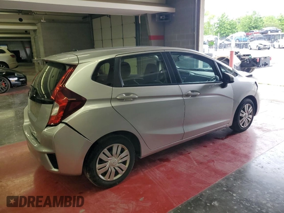 2016 Honda Fit LX with VIN JHMGK5H50GX005947, listed as a Copart auction lot 57699275 with 103,698 mi miles and Salvage title. Bid and sale history available at DreamBid. Image 3.