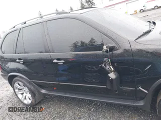 2005 BMW X5 4.8is with VIN 5UXFA93515LE82570, listed as a IAAI auction lot 41759657 with 212,687 mi miles. Bid and sale history available at carsss.com. Image 13.