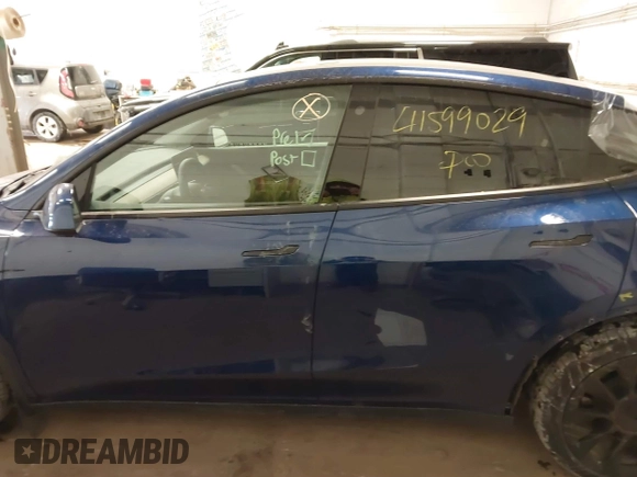 2021 Tesla Model Y Long Range with VIN 5YJYGDEE2MF185945, listed as a IAAI auction lot 41599029 with 53,815 mi miles and . Bid and sale history available at DreamBid. Image 15.