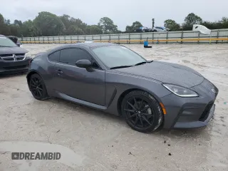 2022 Toyota GR86 Premium with VIN JF1ZNBE13N9757764, listed as a Copart auction lot 77310404 with 12,589 mi miles and Salvage Title. Bid and sale history available at carsss.com. Image 4.
