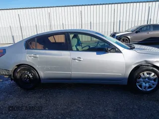 2009 Nissan Altima 2.5 SL with VIN 1N4AL21E89N469084, listed as a IAAI auction lot 41278967 with 246,149 mi miles. Bid and sale history available at carsss.com. Image 13.