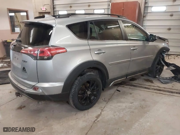 2018 Toyota RAV4 XLE with VIN 2T3RFREV4JW765403, listed as a IAAI auction lot 41853982 with 113,531 mi miles. Bid and sale history available at carsss.com. Image 4.