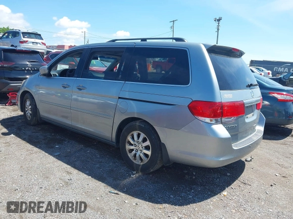 2010 Honda Odyssey EX-L with VIN 5FNRL3H62AB103044, listed as a IAAI auction lot 42199282 with 220,801 mi miles and . Bid and sale history available at DreamBid. Image 3.