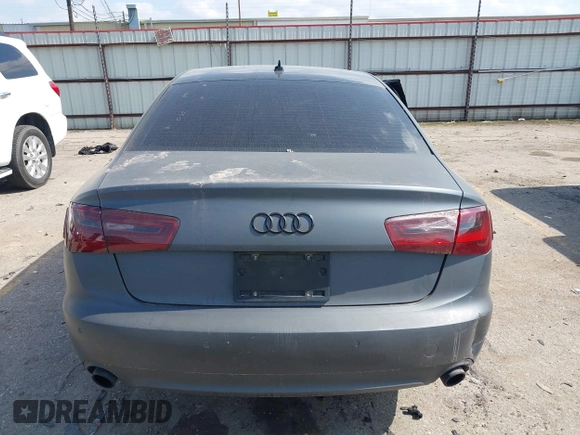 2013 Audi A6 Premium Plus z VIN WAUGFAFC5DN139163, wystawiony jako IAAI lot #41534011 z przebiegiem Nie podano mil oraz . Historia ofert i sprzedaży dostępna na DreamBid. Obrazek 15.