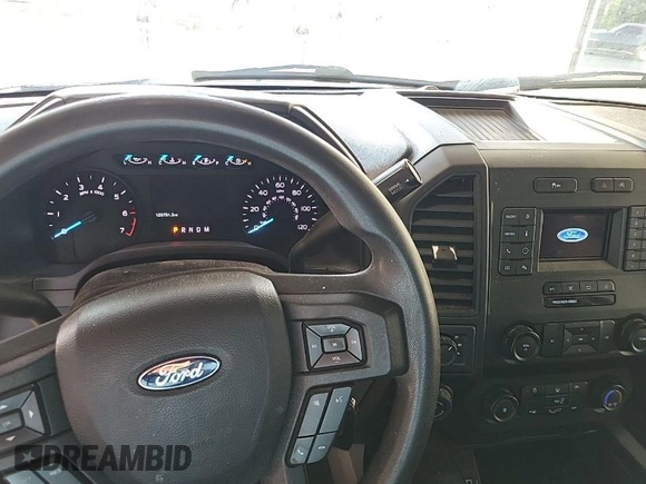 2020 Ford F-150 XL with VIN 1FTFX1E47LKE66864, listed as a IAAI auction lot 42078118 with 129,791 mi miles. Bid and sale history available at carsss.com. Image 1.