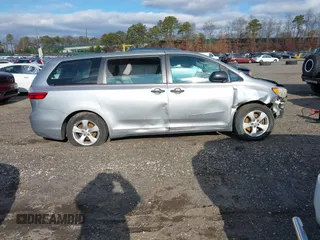 2015 Toyota Sienna L with VIN 5TDZK3DCXFS596277, listed as a IAAI auction lot 41229427 with 108,900 mi miles and . Bid and sale history available at DreamBid. Image 13.