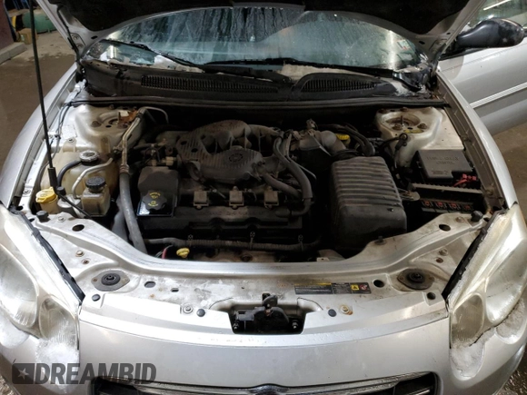 2004 Chrysler Sebring GTC z VIN 1C3EL75R54N327309, wystawiony jako Copart lot #46127865 z przebiegiem 120 715 mil mil oraz Szkoda całkowita • Salvage title. Historia ofert i sprzedaży dostępna na DreamBid. Obrazek 11.