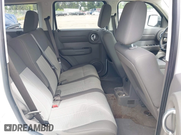 2007 Dodge Nitro SXT with VIN 1D8GT28K37W597001, listed as a IAAI auction lot 42350016 with 104,535 mi miles and . Bid and sale history available at DreamBid. Image 8.
