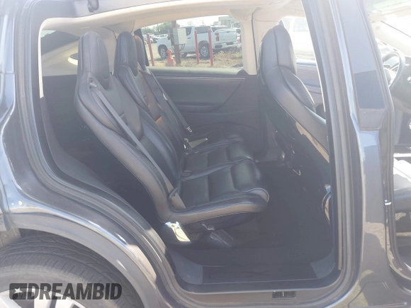 2016 Tesla Model X 70D z VIN 5YJXCAE27GF002541, wystawiony jako IAAI lot #41957228 z przebiegiem 77 199 mil mil oraz . Historia ofert i sprzedaży dostępna na DreamBid. Obrazek 8.