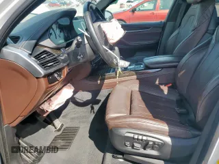 2017 BMW X5 xDrive50i with VIN 5UXKR6C32H0U13460, listed as a Copart auction lot 51462745 with 97,749 mi miles and Salvage title. Bid and sale history available at DreamBid. Image 7.