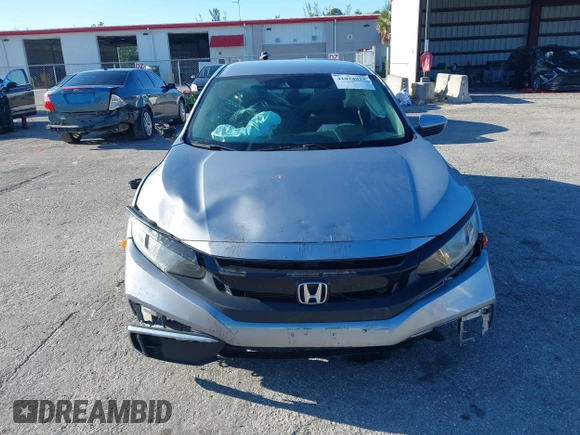 2020 Honda Civic LX with VIN 19XFC2F63LE004953, listed as a IAAI auction lot 41824922 with 71,458 mi miles and . Bid and sale history available at DreamBid. Image 6.