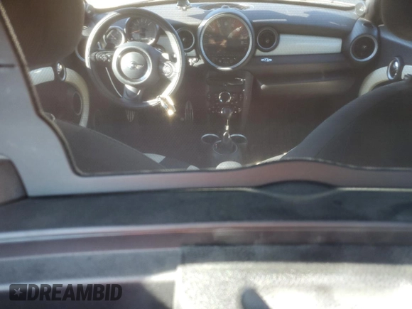 2015 MINI Roadster S z VIN WMWSY3C56FT595466, wystawiony jako Copart lot #69655944 z przebiegiem 53 971 mil mil oraz Szkody całkowita. Historia ofert i sprzedaży dostępna na DreamBid. Obrazek 8.