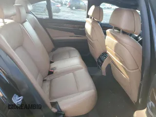2014 BMW 7 Series 750i xDrive with VIN WBAYB6C5XED225112, listed as a Copart auction lot 76395514 with 115,874 mi miles and Clean Title. Bid and sale history available at carsss.com. Image 10.