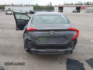 2019 Honda Civic Sedan LX with VIN 19XFC2F66KE024399, listed as a IAAI auction lot 42023498 with 50,173 mi miles. Bid and sale history available at carsss.com. Image 6.