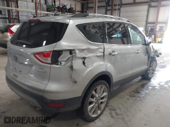 2016 Ford Escape SE with VIN 1FMCU0GX6GUB91605, listed as a IAAI auction lot 41640981 with 130,517 mi miles. Bid and sale history available at carsss.com. Image 4.
