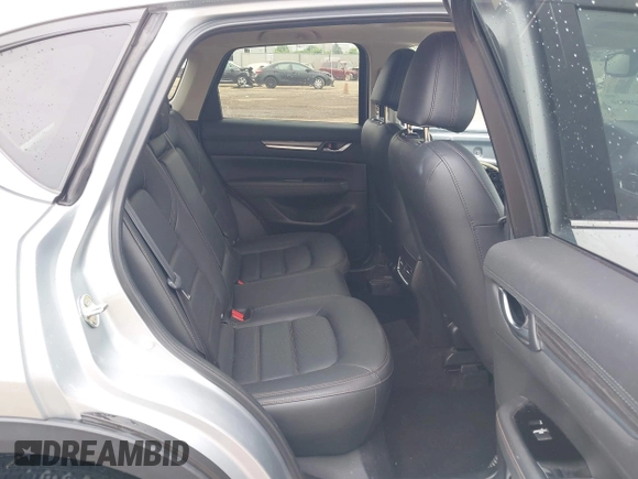 2021 Mazda CX-5 Grand Touring with VIN JM3KFBDM4M0371496, listed as a IAAI auction lot 42428860 with 113,735 mi miles and . Bid and sale history available at DreamBid. Image 8.