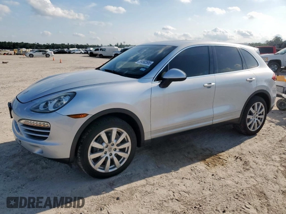 2012 Porsche Cayenne z VIN WP1AA2A22CLA02105, wystawiony jako Copart lot #59392595 z przebiegiem 147 927 mil mil oraz Czysty tytuł • Clean title. Historia ofert i sprzedaży dostępna na DreamBid. Obrazek 1.