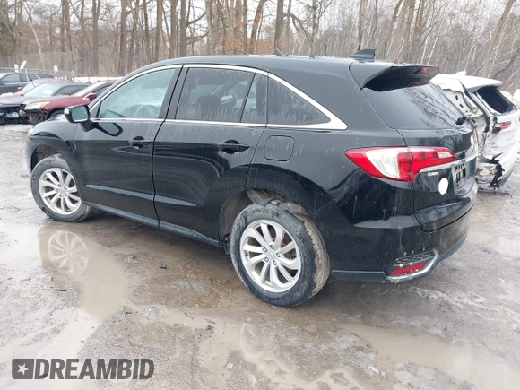 2016 Acura RDX with VIN 5J8TB4H38GL015305, listed as a IAAI auction lot 41672385 with 121,623 mi miles. Bid and sale history available at carsss.com. Image 3.