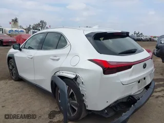 2022 Lexus UX with VIN JTHX3JBH2N2052061, listed as a IAAI auction lot 41878323 with 36,902 mi miles. Bid and sale history available at carsss.com. Image 3.