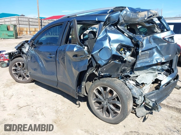 2016 Mazda CX-5 Grand Touring with VIN JM3KE2DY2G0715272, listed as a IAAI auction lot 41590492 with 134,176 mi miles. Bid and sale history available at carsss.com. Image 3.
