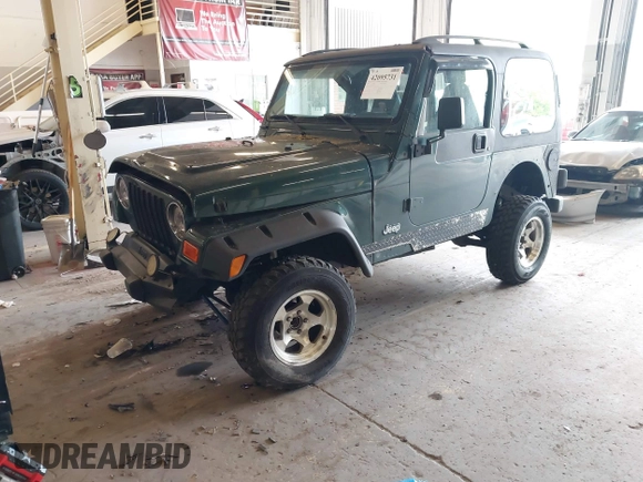 2000 Jeep Wrangler Sport with VIN 1J4FA49S8YP780104, listed as a IAAI auction lot 42095731 with Not provided miles and . Bid and sale history available at DreamBid. Image 2.