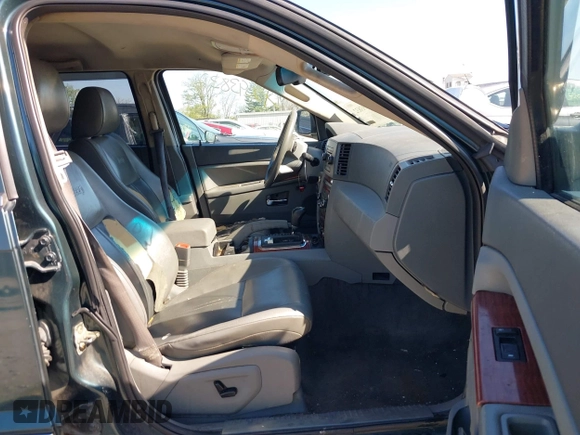 2006 Jeep Grand Cherokee Limited with VIN 1J4HR58NX6C114451, listed as a IAAI auction lot 42093832 with 264,418 mi miles. Bid and sale history available at carsss.com. Image 5.