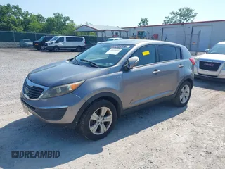 2012 Kia Sportage LX with VIN KNDPBCA28C7237079, listed as a IAAI auction lot 42663554 with 245,420 mi miles and . Bid and sale history available at DreamBid. Image 2.