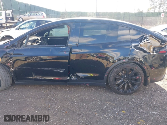 2023 Tesla Model X with VIN 7SAXCAE59PF377408, listed as a IAAI auction lot 41176738 with 32,496 mi miles and . Bid and sale history available at DreamBid. Image 6.