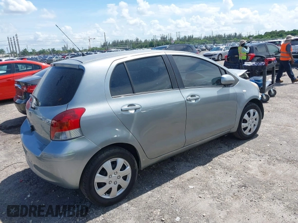2010 Toyota Yaris with VIN JTDKT4K31A5318793, listed as a IAAI auction lot 39910045 with 192,737 mi miles. Bid and sale history available at carsss.com. Image 4.